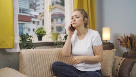 the woman is talking on the phone, arguing.