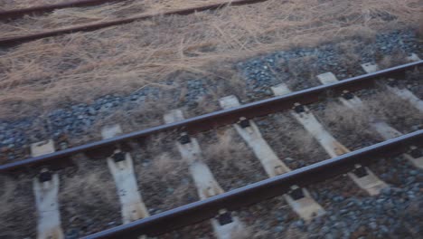 train tracks view of motion as traveling across countryside