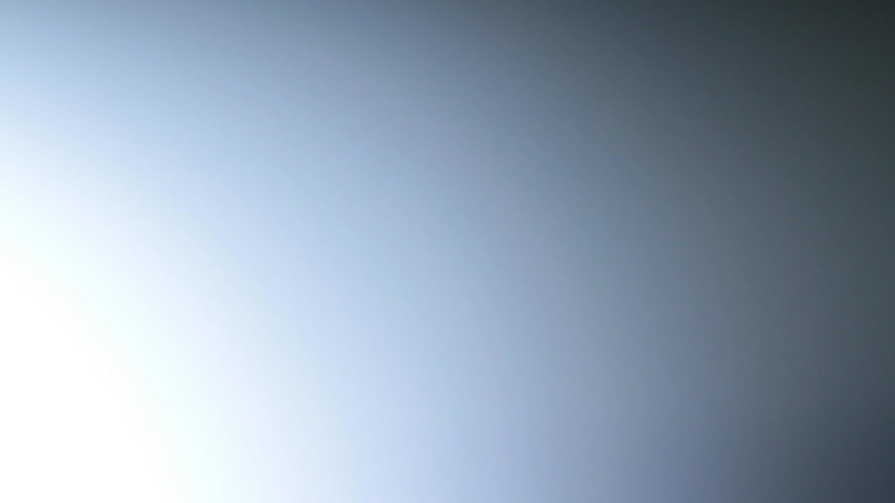 Light Leak Transition with Blue and White Glow