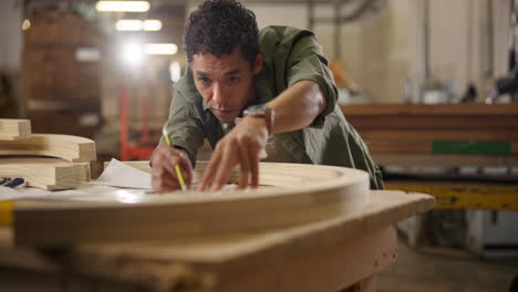 man woodworking in workshop
