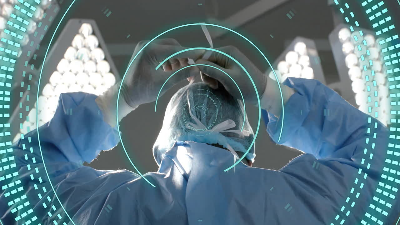 Animation of scope scanning and data processing over african american surgeon in operating theatre