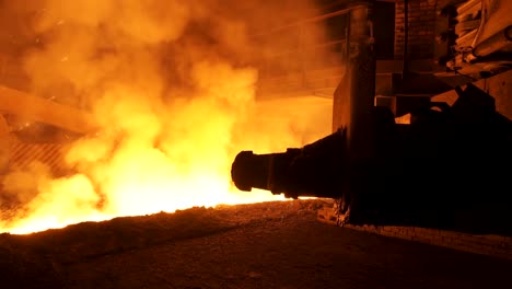 steel mill smelting process at night