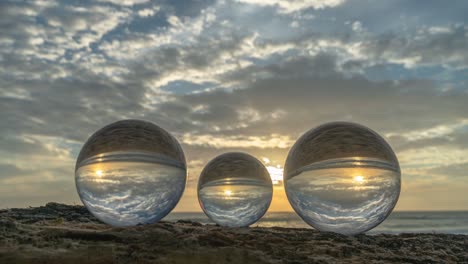 scenery sunset in crystal balls on the timber.