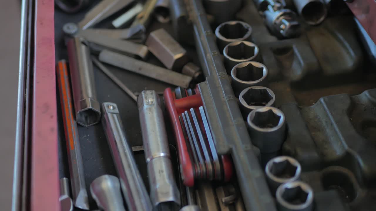 A close up shot of tools from a drawer  of a toolbox