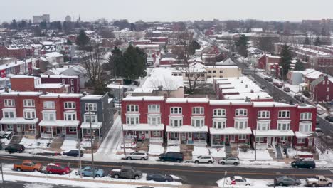 Aerial-of-red-rowhomes-in-urban-city-in-USA