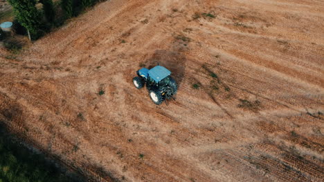 aerial view of tractor working in a field