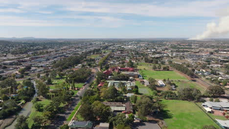 aerial: wide drone shot of griffith town, nsw australia