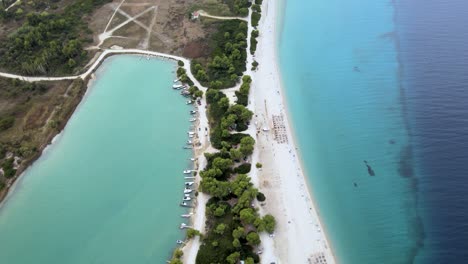 Cinematic-overhead-4K-drone-clip-over-a-peninsula-in-Paliouri,-Chalkidiki-in-North-Greece