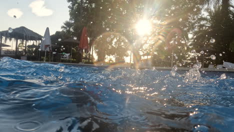 Brother-and-sister-play-in-the-pool-in-the-evening