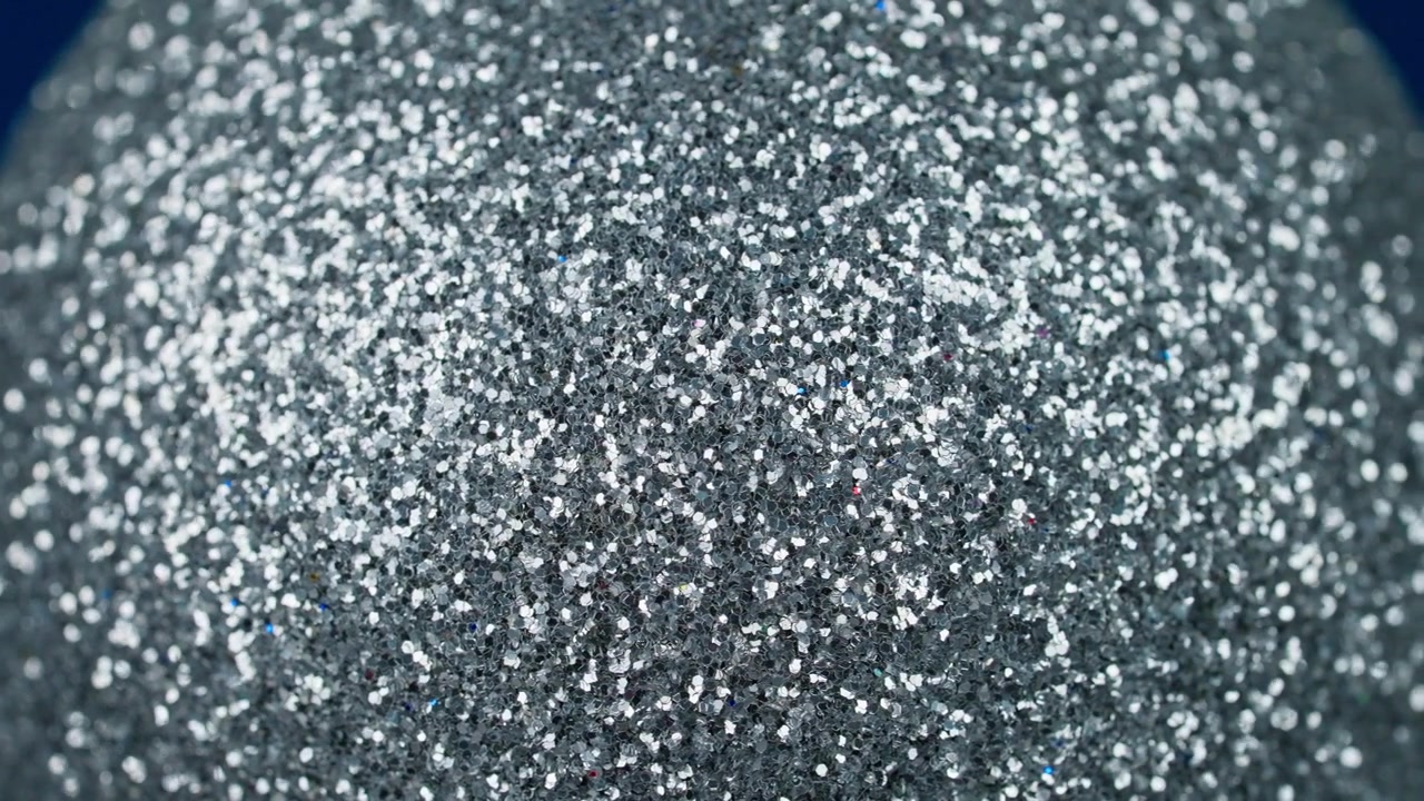 Närbild på skimrande silverglitterbakgrund