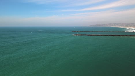 oceanfront jetties at entrance channel of mission bay in san diego, california