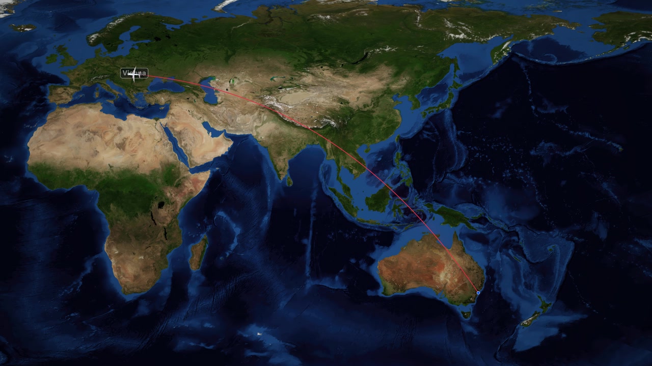 A digital world map tracks an airplane flying from Sydney to Vienna with red lines