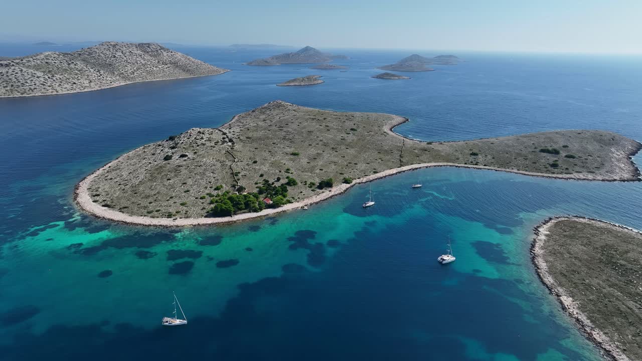 Aerial View Of Boats Sailing In The Blue Sea Around The Island In Kornati, Croatia.