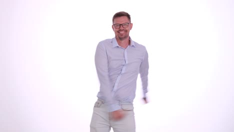 happy man dancing energetically on a white background