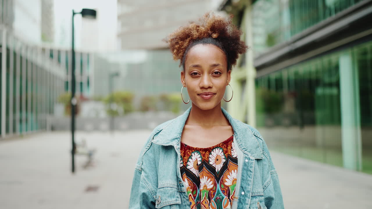 Portrait of a Smiling Woman in Urban Setting