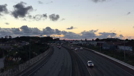 heavy traffic on motorway during rush hour in the early evening in auckland new zealand