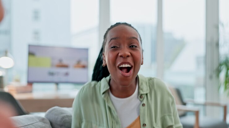 Catch, popcorn and black woman in celebration