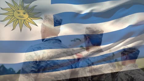 animación de la bandera de uruguay sobre varios soldados varones