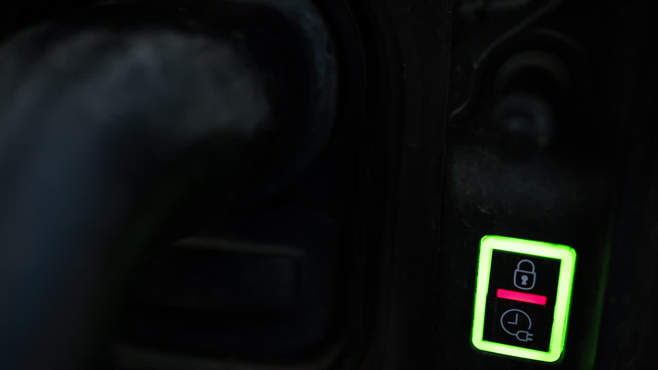 Close up of an electric car charging on the street