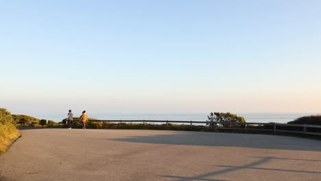 cyclists riding near coastal military bunker