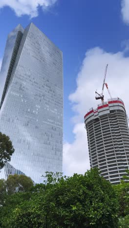 a tall building with a crane on top of it