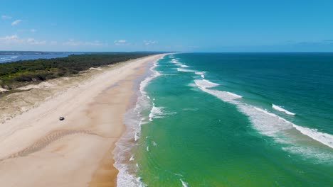 4wd driving along south stradbroke island beach