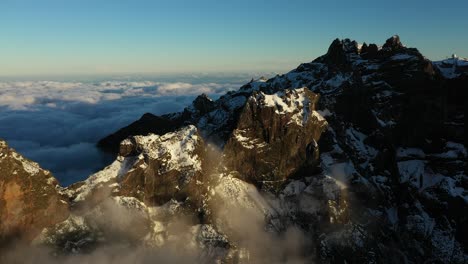 clear sky and thin clouds on top of the mountain pico ruivo in madeira