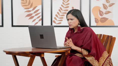 indian female boss on video call meeting