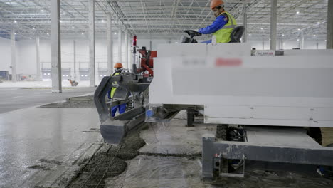 pouring concrete floor in a large warehouse