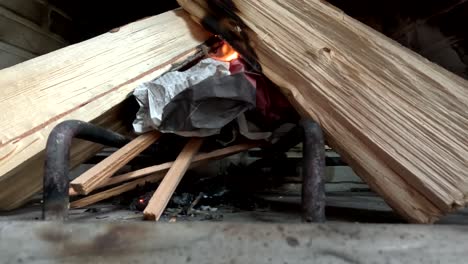 cozy fireplace with burning wood logs