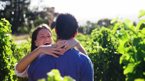 romantic couple in love at a vineyard