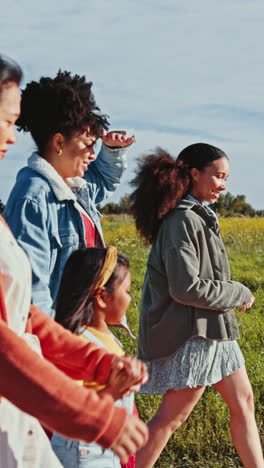 Sunrise,-countryside-and-girls-walking-on-holiday