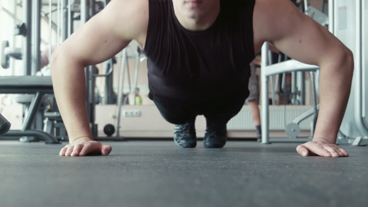 Man Doing Push Up Exercise in Park. Fitness Man Doing Pushups Outdoor (Stock Footage)