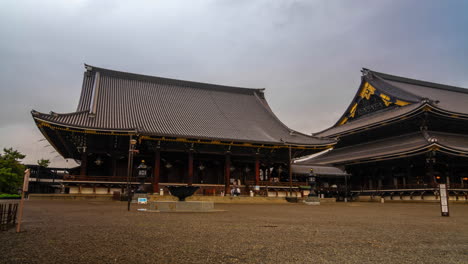 temple shrine higashi hongan-ji at kyoto japan time lapse clouds rainy gray day before close the place