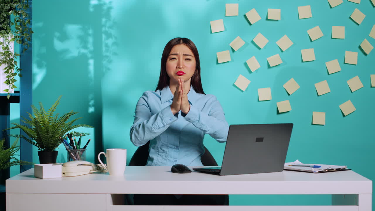 Pleading businesswoman imploring