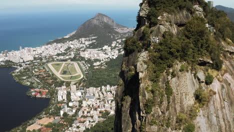 Drone-flying-up-the-Corcovado-Hill-unveiling-the-Christ-the-Redeemer-Statue-on-in-Rio-de-Janeiro