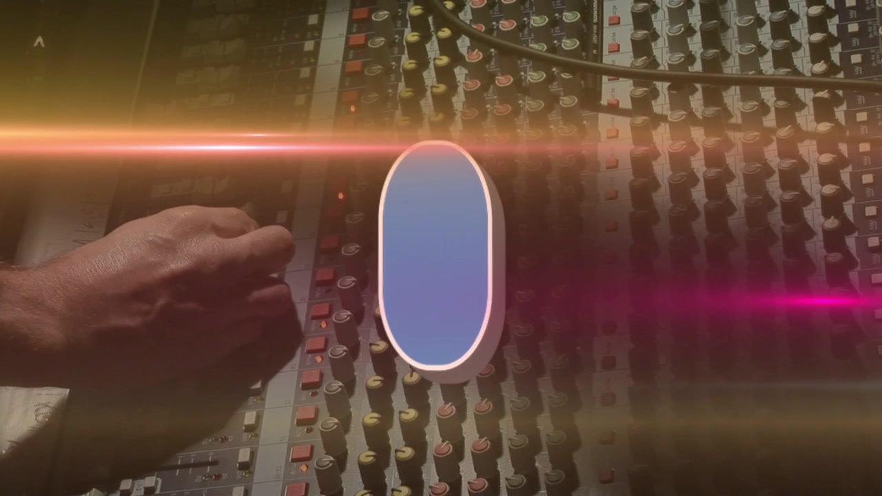Warm light streak starting likes overlay updating to show likes on console as hand adjusting faders