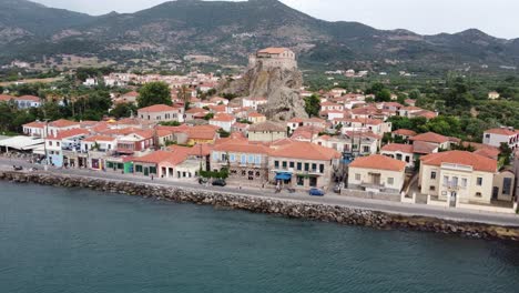 petra village, virgin mary greek orthodox church atop rock surrounded with mountains, lesbos island, aegean sea, drone shot