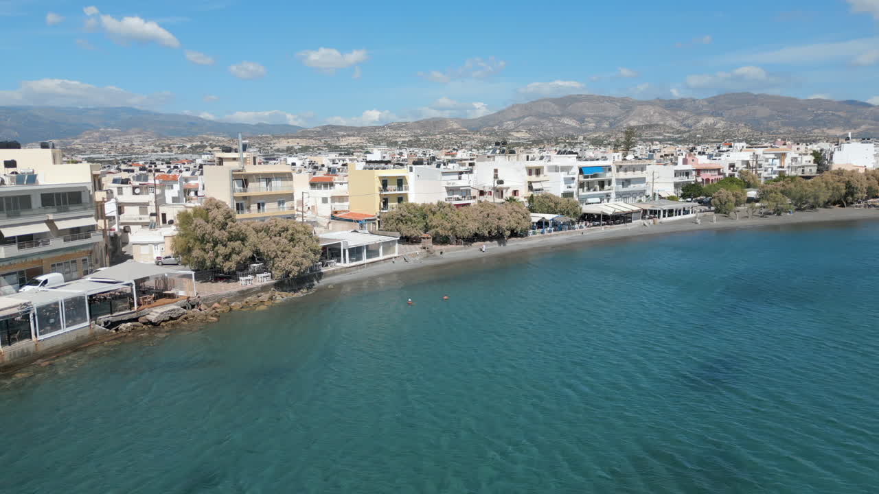 Ierapetra Waterfront Crete Greece Drone Track Back Pan 4K 60FPS