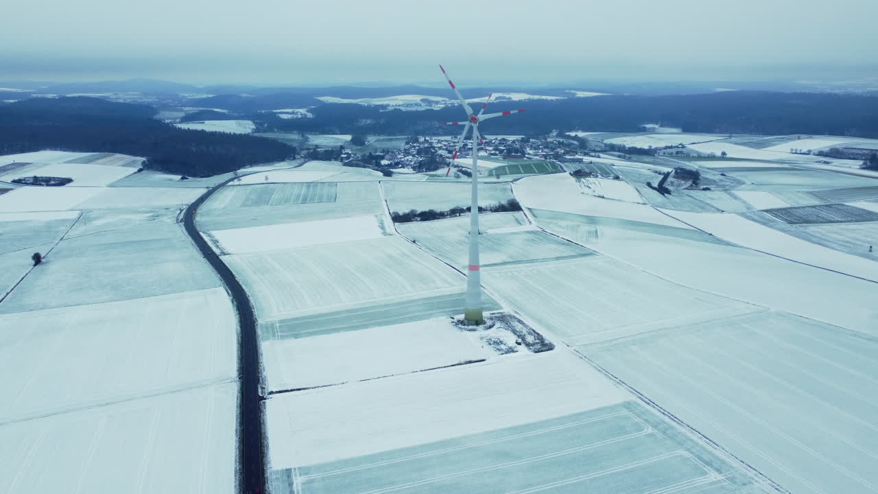 Snowy Landscape with Wind Turbine