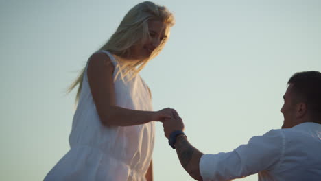 beautiful boy and girl in love together. romantic date of love couple at sunset