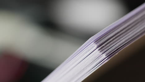 abstract macro close-up of paper feeding into a printer