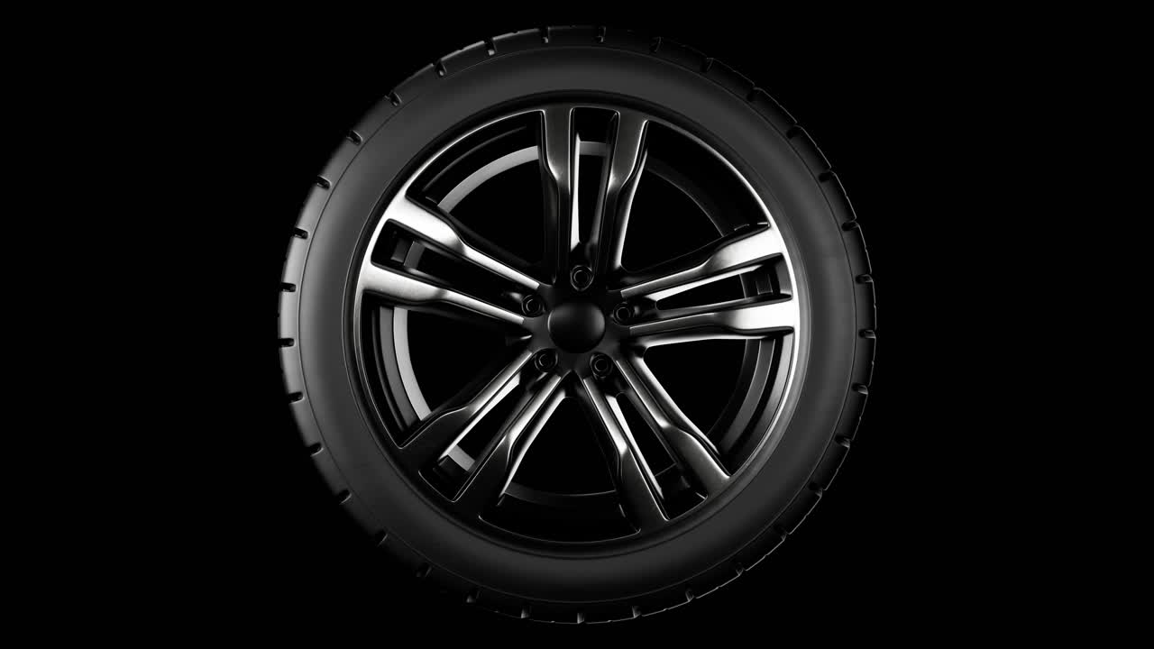Spinning car wheel. Black rubber automotive tire. Auto service concept, changing wheels. Loop animation