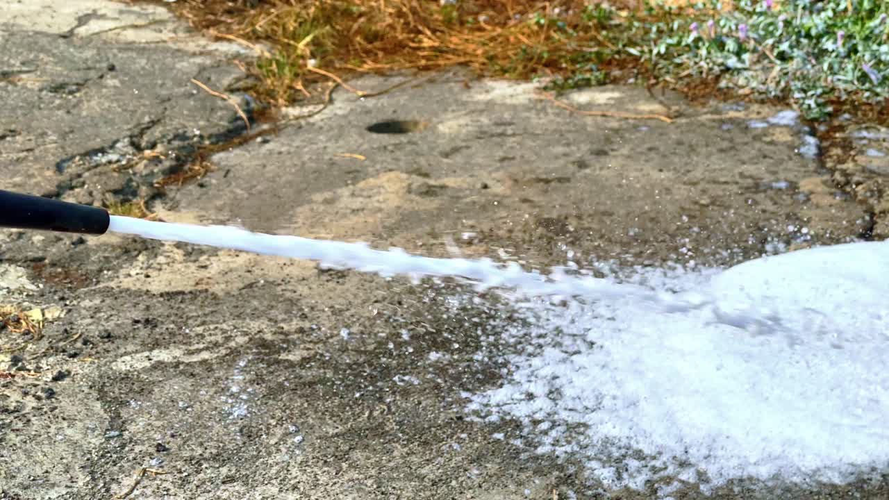 Foam coming out of the fire extinguisher nozzle