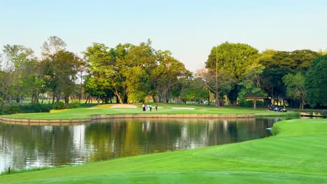 peaceful golf course scene with lush greenery