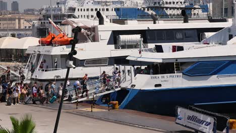 people boarding a ferry at sorrento pier