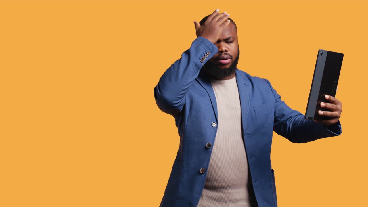 Discontented man disappointed by friends words during videoconference