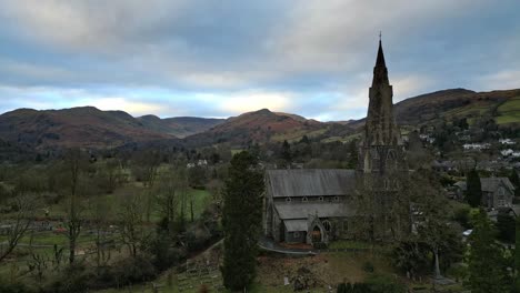 Aerial-footage-of-Ambleside-the-Lakeland-town-and-former-civil-parish,-now-in-the-parish-of-Lakes,-in-Cumbria,-in-North-West-England-2023