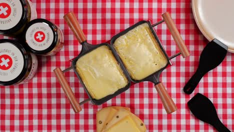 raclette cheese, swiss culinary specialty, slowly melting