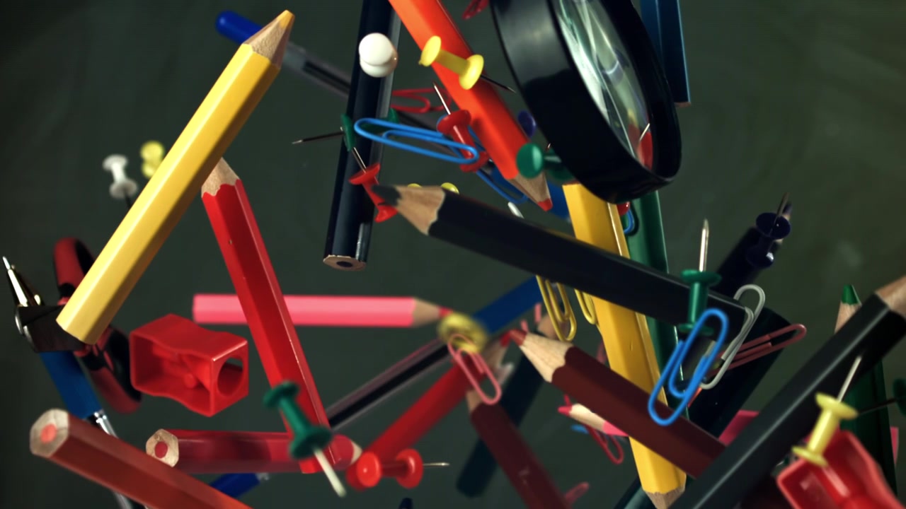 Colorful School and Office Supplies Floating in Slow Motion